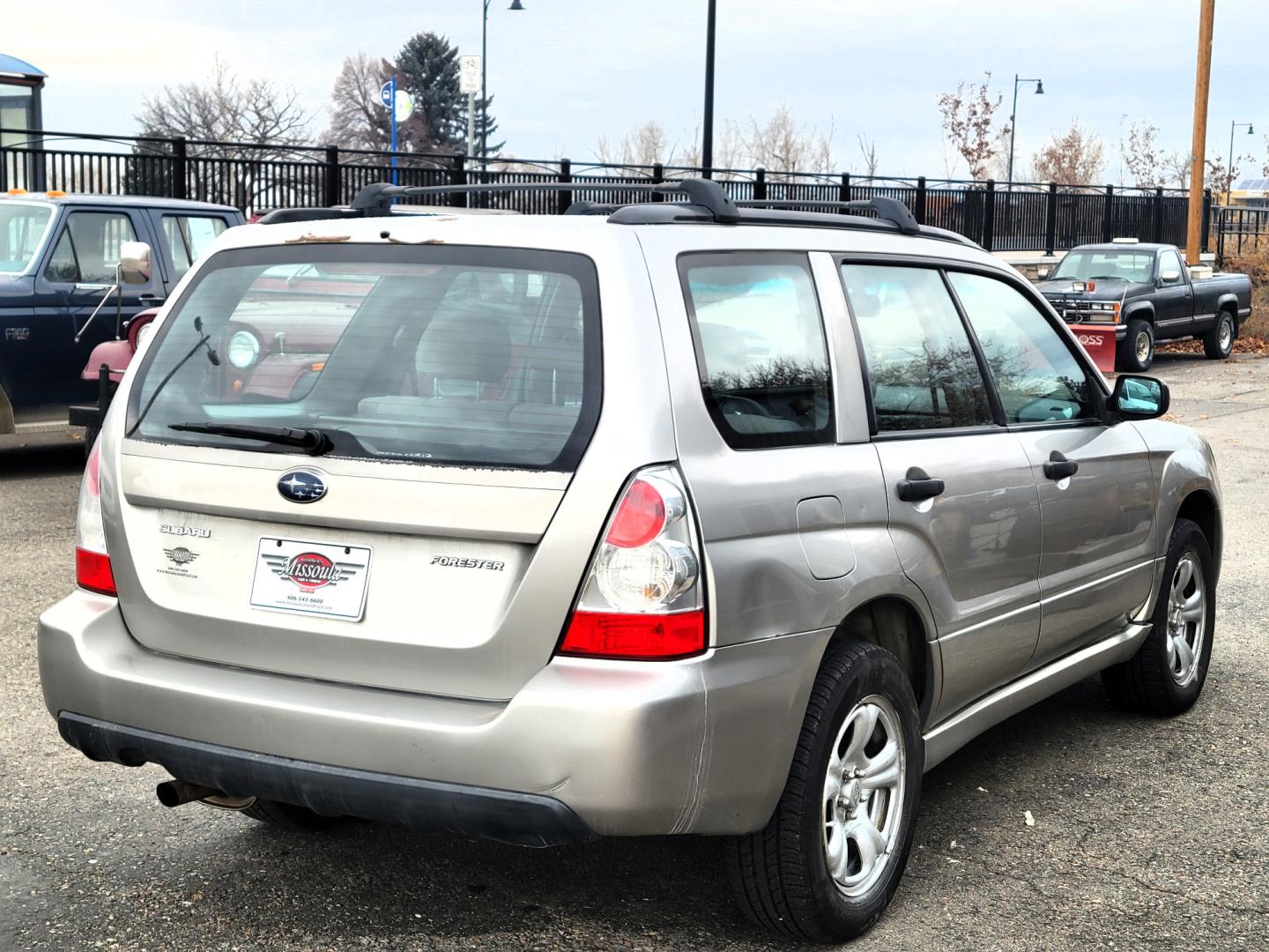 2006 Grey /Tan Subaru Forester 2.5X (JF1SG63606G) with an 2..5L H4 engine, 5 Speed Manual transmission, located at 450 N Russell, Missoula, MT, 59801, (406) 543-6600, 46.874496, -114.017433 - Great Running Subaru. 1 Owner. All Wheel Drive. 5 Speed Manual Transmission. Air. Cruise. Tilt. AM FM CD Player. - Photo#3